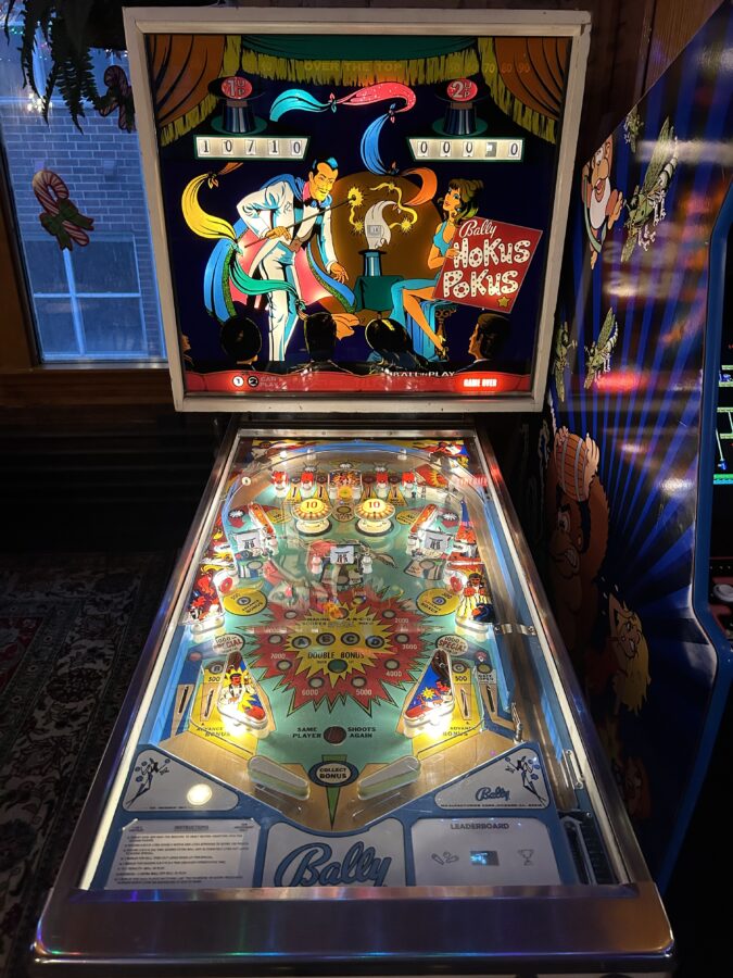 Lights and sounds of a vintage pinball machine