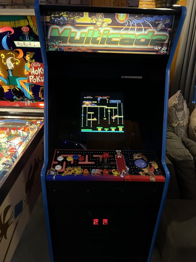 Themed Room has vintage stand up video game arcade