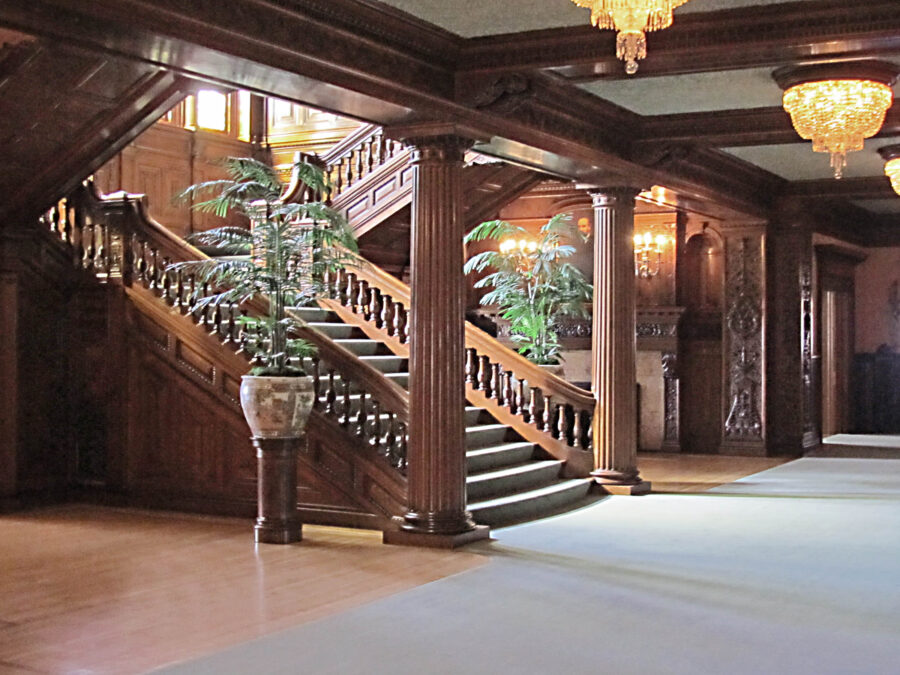 grand staircase and hall at the Hill house