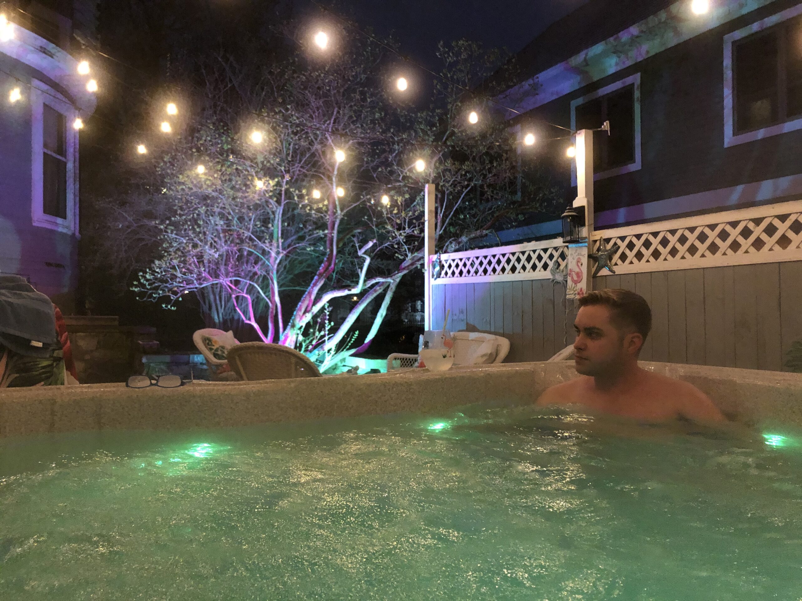 A guest soaks in the four-season garden hot tub at 300 Clifton after a long day at the Minnesota State Fair
